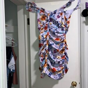 It’s a very pretty orange, blue purple, violet, pink yellow dress